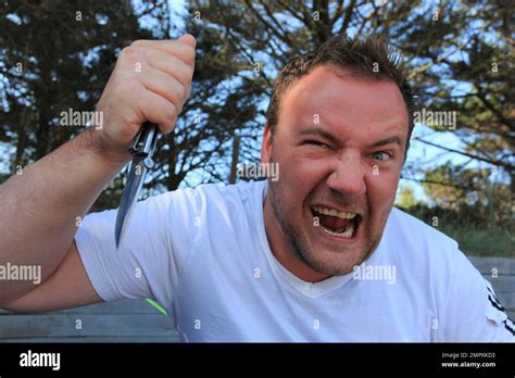 Angry Aggressive Man Holding Knife Hi Res Stock Photography And Images