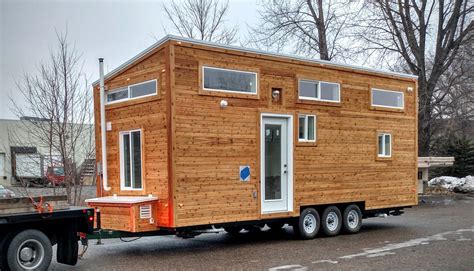 Outdoor guide builds ultimate pop up truck camper on land rover defender & starts hower overland. Build your own tiny home for under $10k. See the details here. | Tiny house trailer, Tiny house ...