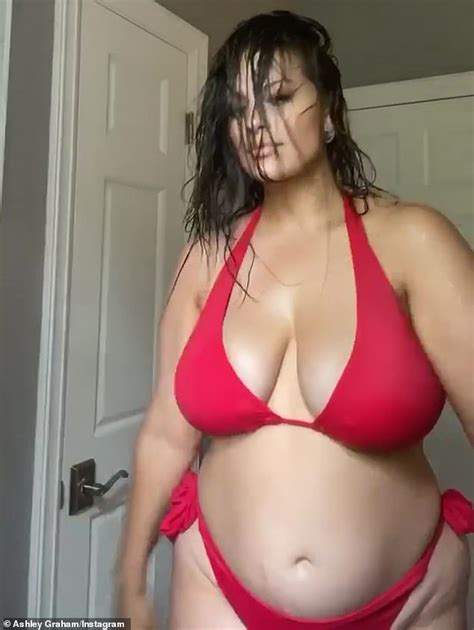 Ashley Graham Showcases Her Cleavage In A Red Bikini As She Dances And Whips Her Wet Hair Around
