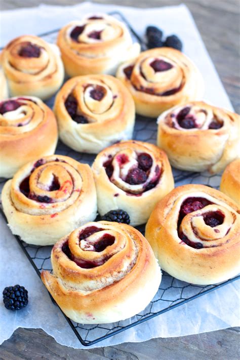 Soft Sweet Rolls With Cinnamon And Fresh Blackberries Topped With Cream