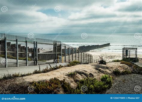 United States Border Wall With Mexico Meeting The Pacific Ocean In