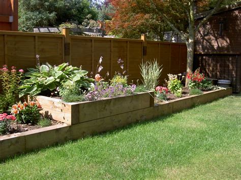 Build or obtain a raised garden bed frame. Raised beds from new Pine railway sleepers