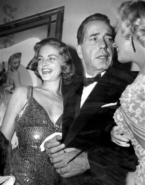 Marilyn Monroe With Humphrey Bogart And Lauren Bacall At The Premiere Of How To Marry A