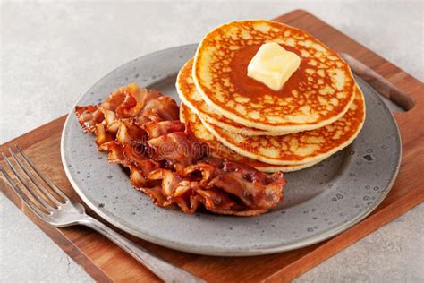 Sweet Pancakes With Butter And Bacon Traditional American Breakfast