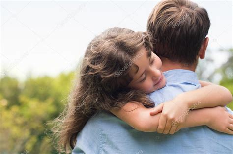 Daughter Embracing Father Stock Photo By ©ridofranz 108626874