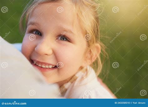 The Joys Of Being A Kid Portrait Of A Cute Little Girl Enjoying The