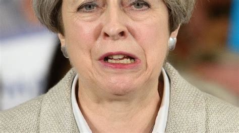 theresa may forced to deny she s a glum bucket on campaign trail amid tumbling conservative