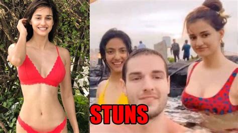 disha patani stuns netizens as she dances in pool in red bikini see the best porn website