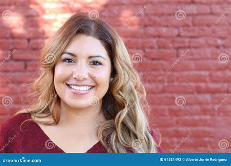 Portrait Of A Young Hispanic Female Smiling Stock Photo Image 64531493