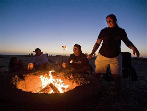 There are no known copyright restrictions on this image. justaddchristie: Huntington Beach Fire Pits