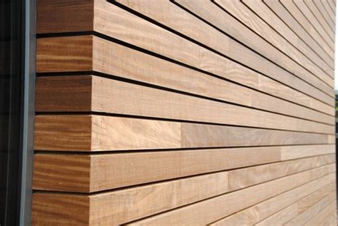 The Side Of A Building With Wood Siding