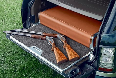 The special edition fleet will not come with a piece, but there will be a nifty carbon fiber and aluminum gun rack option. Holland & Holland Range Rover comes with shotgun holsters ...