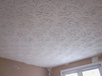 Our specific variety of textured ceiling has a few names: BonnieProjects: Removing textured ceilings