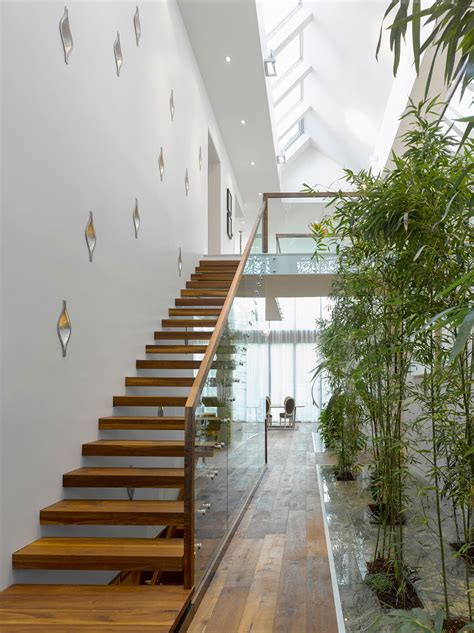 Bamboo is such a popular plant, so why don't we use it in the interior. Modern Custom Home With Central Atrium And Interior Bamboo ...
