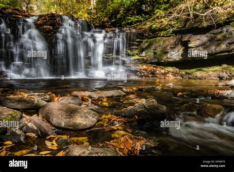 Waterfalls Are Surrounded By Colorful Fall Foliage At Ricketts Glen