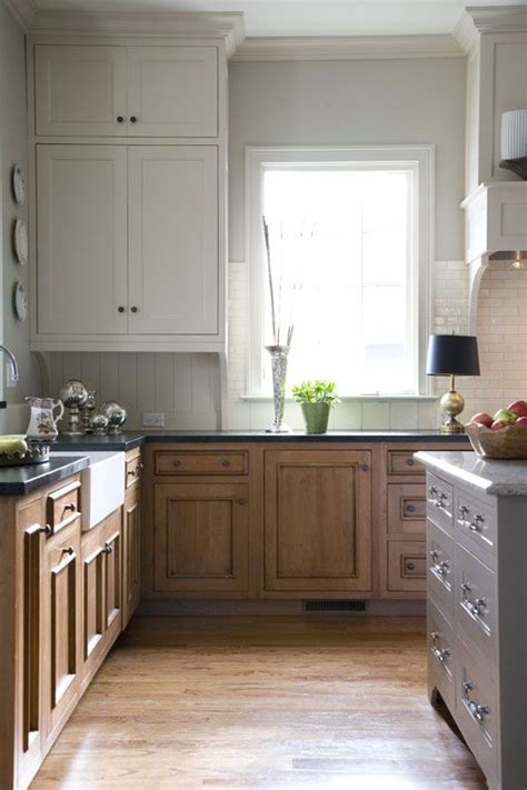 Whether you choose to combine gray cabinets and a white countertop or gray lower cabinets and white upper wall cabinets, you simply cannot make a mistake. Just the wood and white cabinets! stained lower cabinets ...