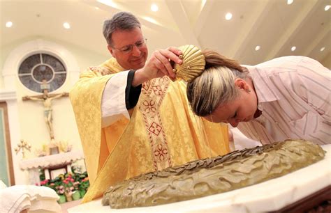 Father Greg Baptizing Catechumen Susan Zabiela For Easter