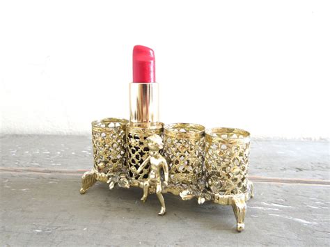 vintage lipstick holder 1950 with cherub