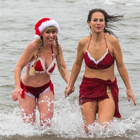Christmas Swim Sees Uk Swimmers Strip For Festive Dip Across Britain