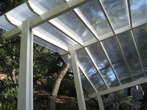 We have a deck which is the roof or our sun room. Clear Patio Covers | Canopy Concepts, Inc.
