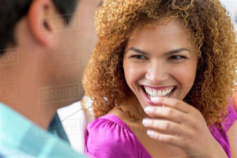 Mixed Race Couple Talking Together Stock Photo Dissolve