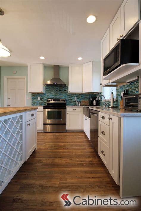 1285 houston st jacksonville fl 32204. White coastal kitchen featuring Shaker style cabinets on the perimeter and island. #shaker ...