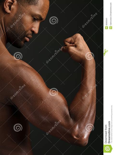 Young African American Man Flexing Biceps Stock Image Image Of