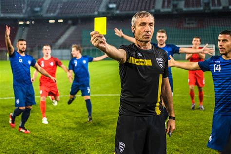 Check spelling or type a new query. Soccer Referee Showing Yellow Card Stock Photo & More Pictures of Adult - iStock