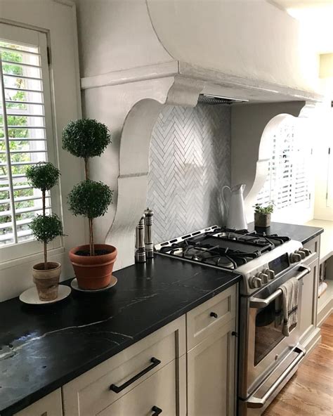 A plaster back splash would be tricky to keep clean. Venetian plaster range hood by the talented @titan ...