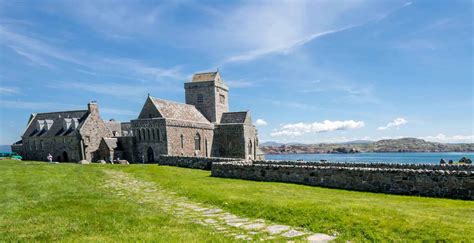 Iona assumes the appearance of a young boy with white hair, light blue eyes and white robes appropriate for cold climates. Isle of Iona, Scotland