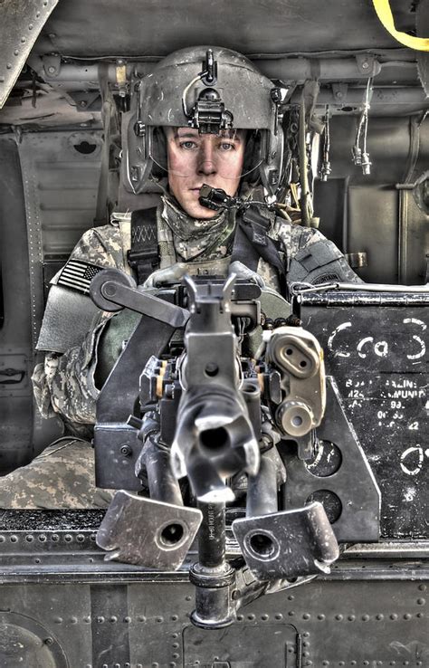 A Uh 60 Black Hawk Door Gunner Manning Photograph By Terry Moore Pixels