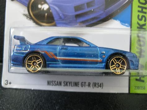 Buy Hot Wheels Hw Workshop Nissan Skyline Gt R R34 Blue Online At
