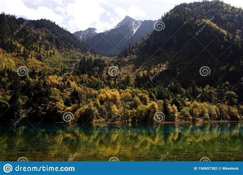 Landscape Shot Of A Lake Trees And Mountains At The Jiuzhaigou