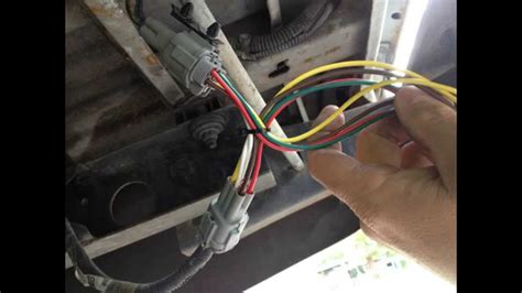The instructions it came with is vague for me. how to install Trailer Wiring Harness For Nissan Frontier 1999 - YouTube