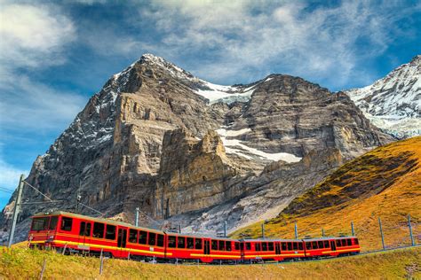 Electric Tourist Train And Famous Eiger Peak Bernese Oberland