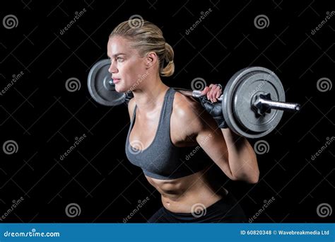 Muscular Woman Lifting Heavy Barbell Stock Photo Image Of Focused