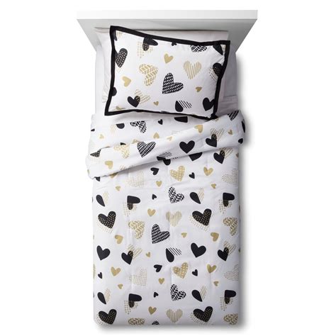 If you're heading in to target soon, keep your eyes peeled for kids character bedding and fun mealtime sets marked on clearance for up to 70% off! Fall in love with the Hello Hearts Comforter Set in Black ...