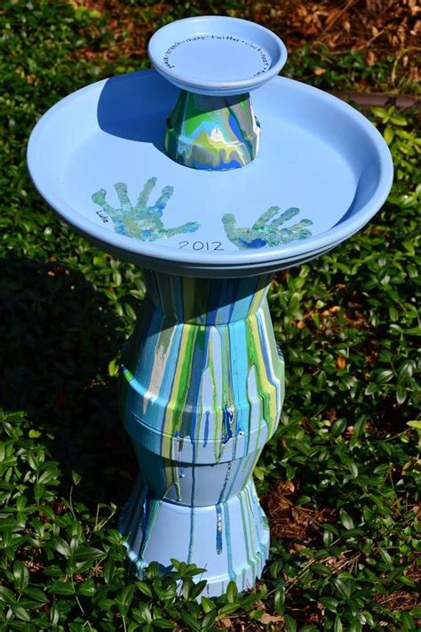 Use an adhesive and recommended hardware to do so! DIY Bird Bath with Hand Print Art | Diy bird bath, Clay pot crafts, Terra cotta bird bath