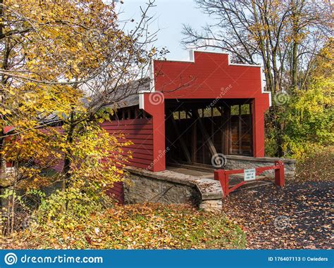 Red Covered Bridge Surrounded By Fall Foliage Stock Image Image Of