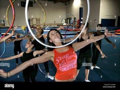 masha krakovskaya cq leads a class in rhythmic gymnastic exercises she uses the loop to do