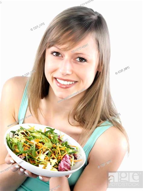 Portrait Of Young Happy Woman Eating Salad Stock Photo Picture And