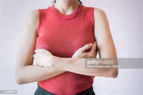 Hand On Breast Photos Et Images De Collection Getty Images