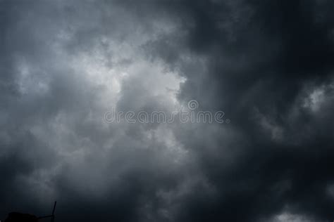 Dark Black Clouds In The Sky Stormy Rain Clouds Background Stock Image