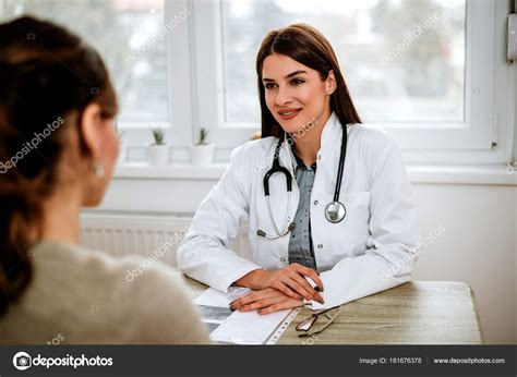 Female Doctor And Patient Stock Photo By Bnenin