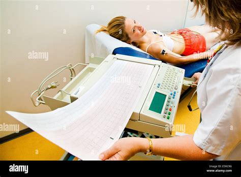 Woman Undergoing An Electrocardiography EKG Examination Department Stock Photo Royalty Free