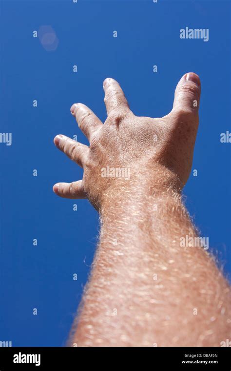 Hand Reaching To Sky Hi Res Stock Photography And Images Alamy