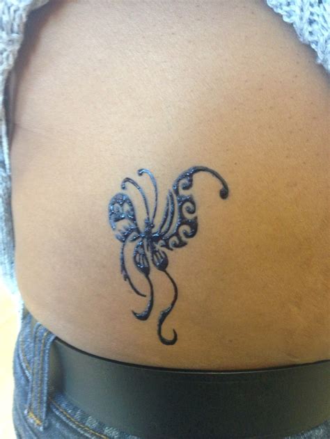 While you often see henna stands at markets or at festivals (with very experienced people doing the tattooing), you don't often see it being sold in places like your local makeup shop! Henna butterfly tattoo | Henna butterfly, Butterfly tattoo ...