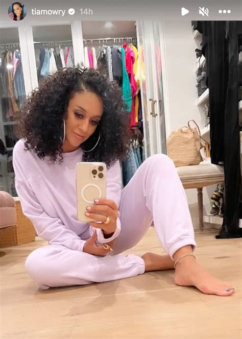 Tia Mowry Poses Barefoot In Comfy Lavender Sweatshirt Footwear News