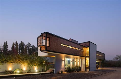 Chilean Home With Striking Exterior And Cantilevered Top Level