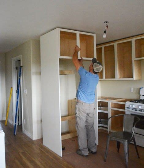Above fridge cabinet ideas google search kitchen cabinet. home build refrigerator surround - Google Search | Kitchen ...